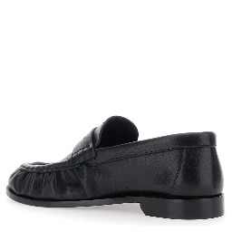 Le Loafer Black Loafers with rounded toe and Cassandre plate in Leather for Women