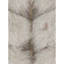 white fur with raised collar and front zip closure in fur for women