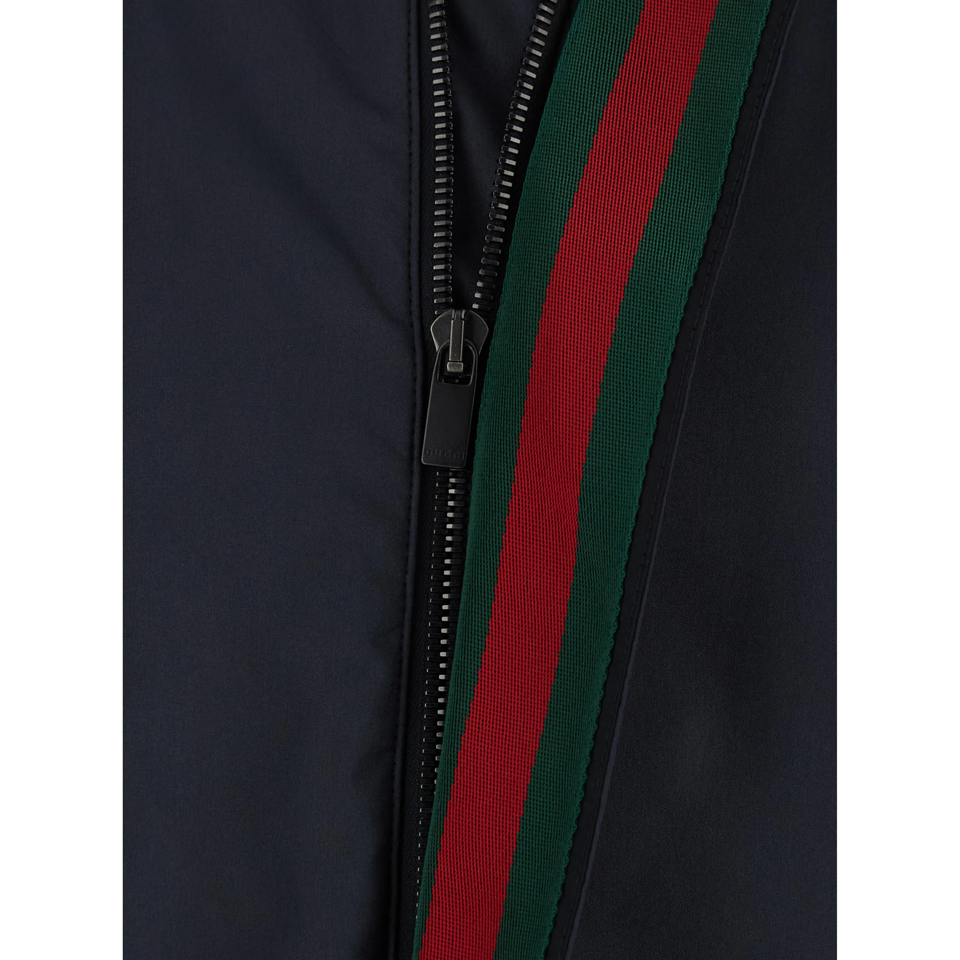 Black Jacket with high collar and hidden Web Stripe on the closure in Tech Fabric men