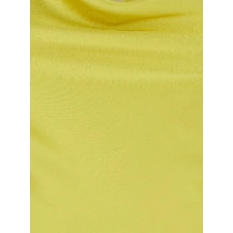 MARIA GOWN is a long dress characterized by a yellow tech fabric and woman