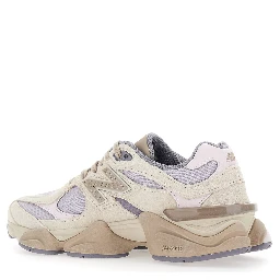 9060 Pink Low Top Sneakers with insert design and logo patch on the side in fabric and leather unisex