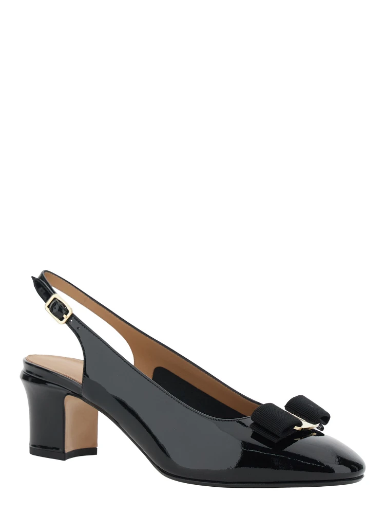 Vetty Black Pumps with Logo Plate on the Front and Low Block Heel in Leather Woman alternative