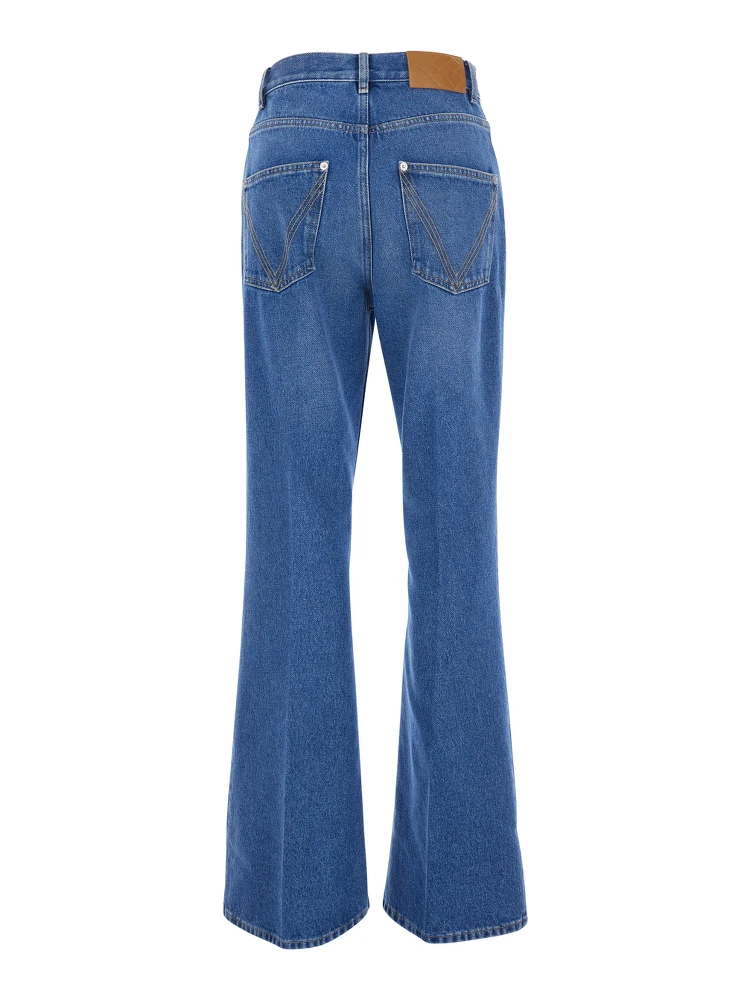 Blue Jeans with logo patch on the back and flared leg in denim for women alternative