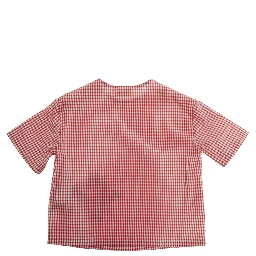 red T-shirt with check pattern and patch on the front in fabric baby