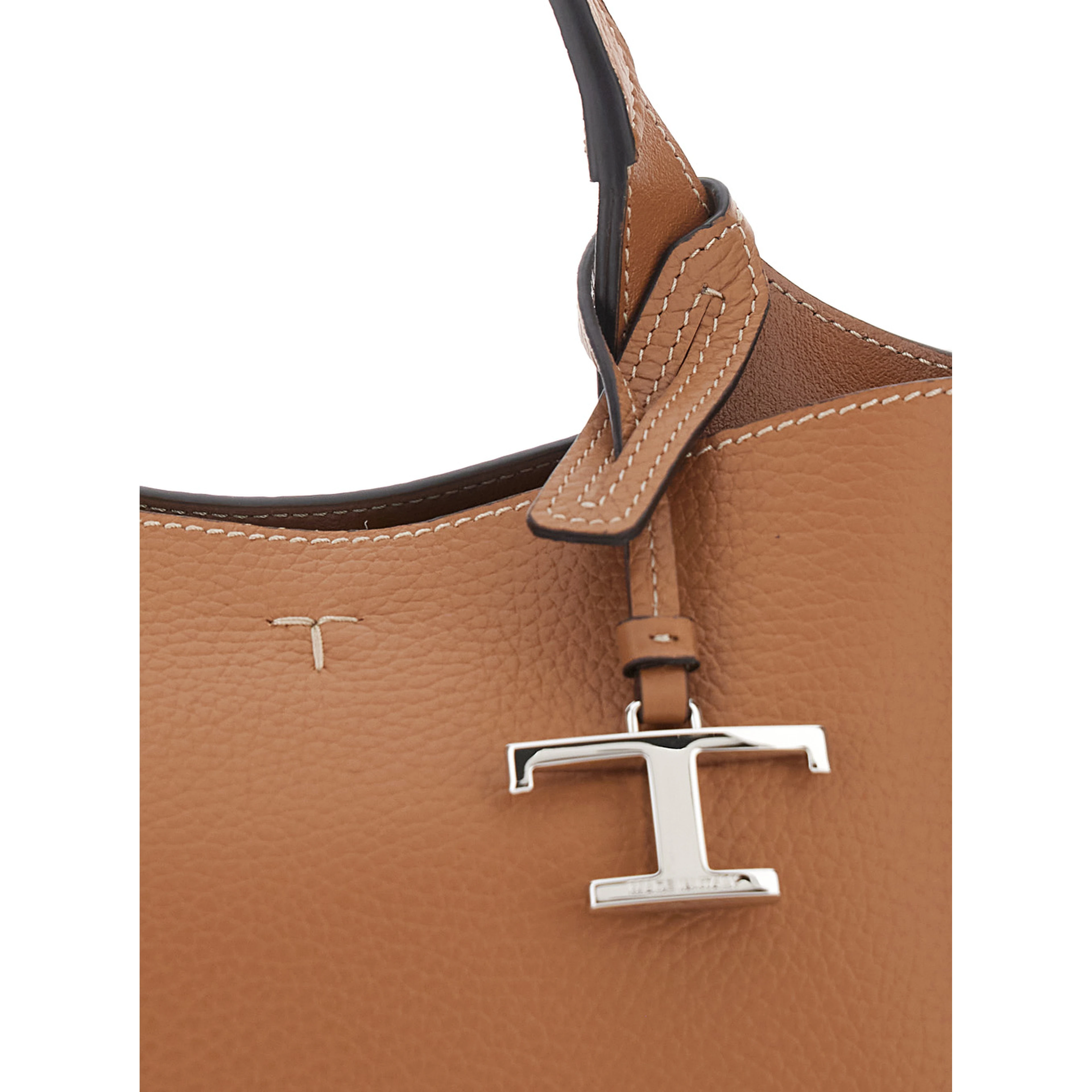 Brown Handbag with adjustable and removable shoulder strap and T plaque pendant on the front in grained leather for women