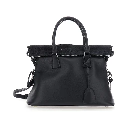 Black Crossbody bag with adjustable and removable strap and Four Stitches detail on the back in leather for women