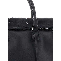 Black Crossbody bag with adjustable and removable strap and Four Stitches detail on the back in leather for women