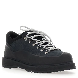 Black ankle boots with rubber lug sole and logo lettering on the tongue in leather for men