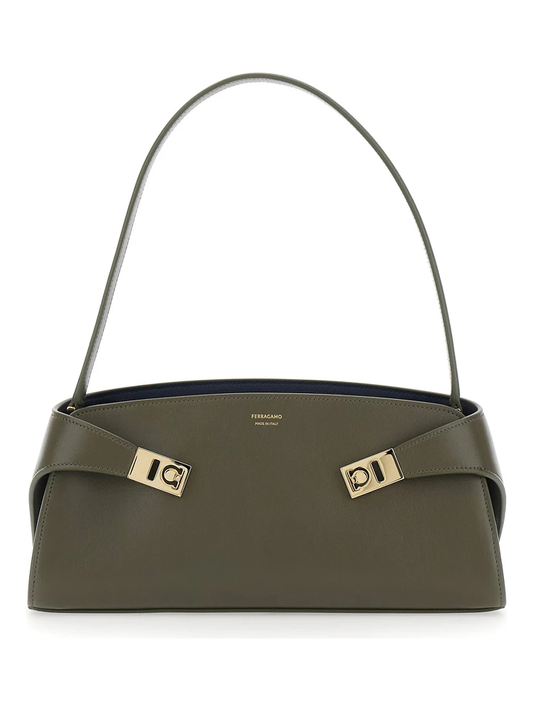 Hug East West Green Shoulder bag with shoulder strap and buckled belts on the front in leather for women