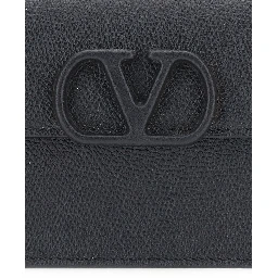Black mini bag with chain strap and VLogo plaque on the front in leather for women