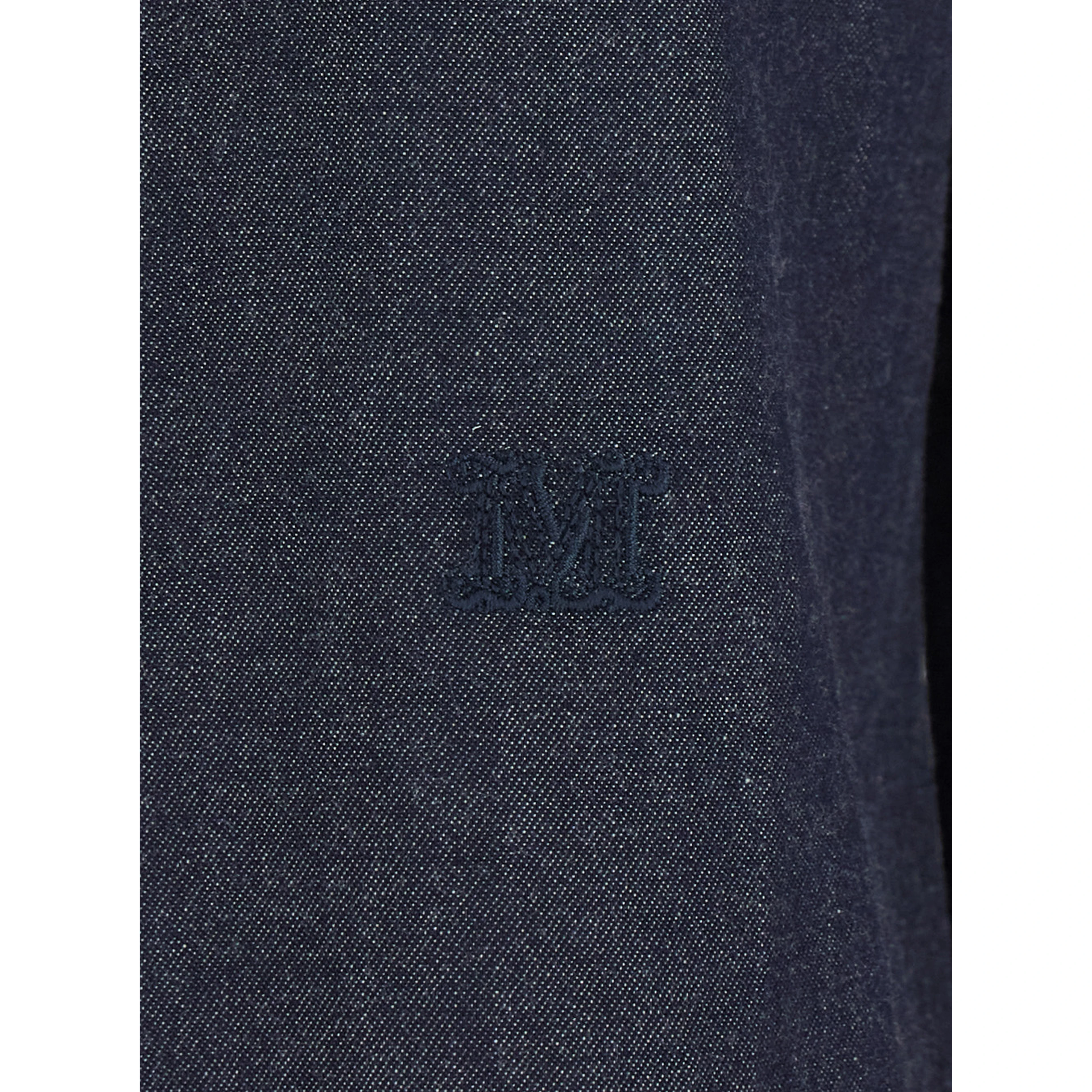 MOLO is a shirt with a classic collar and long sleeves in blue tech fabric for women