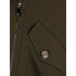 Green Jacket with wide fur collar and off-center zip closure on the front in cotton for women