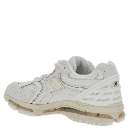U1954 White Low Top Sneakers with Logo Patch on the Side and Perforated Design in Leather and Fabric Unisex