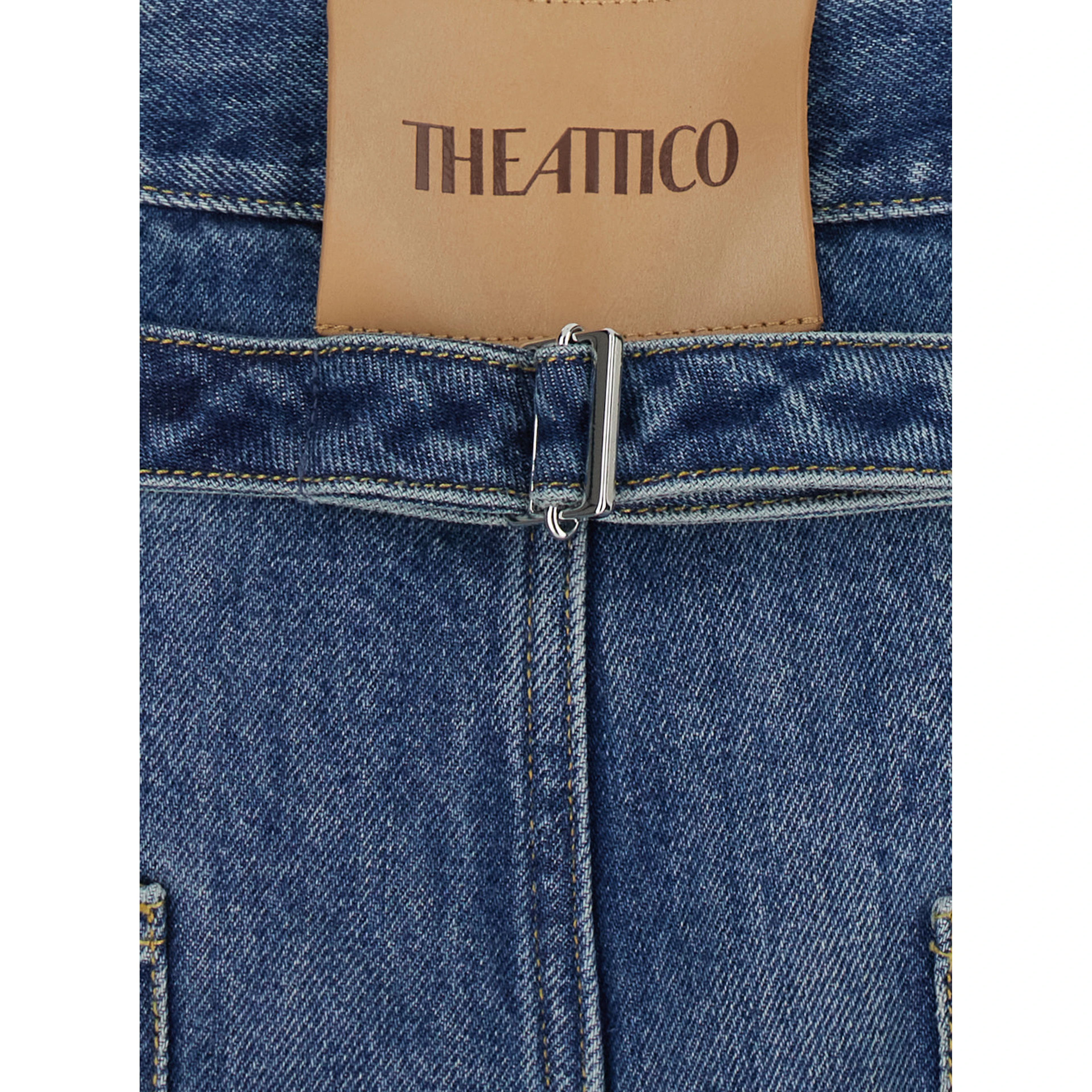 Blue jeans with logo patch on the back and faded design in denim for women