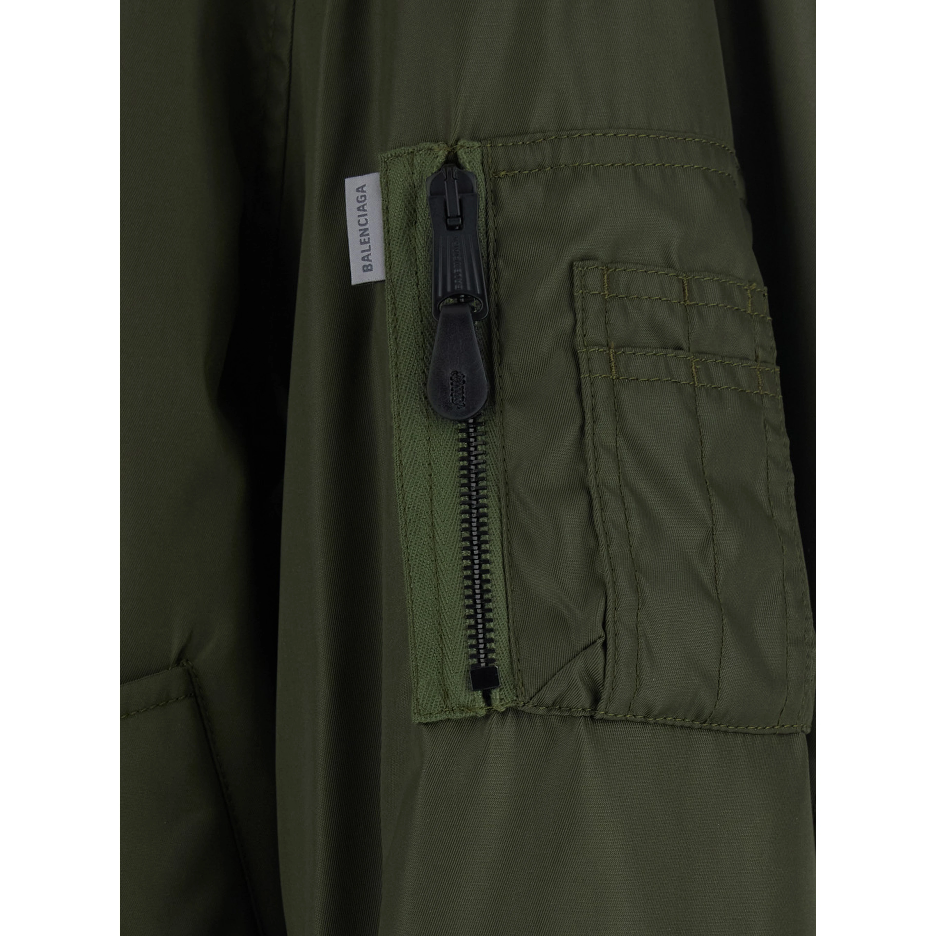green Bomber with embossed logo on the sleeve in tech fabric men