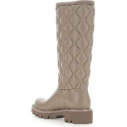 Beige Knee-High Rain Boots with logo patch on the side and quilted design in plastic for women