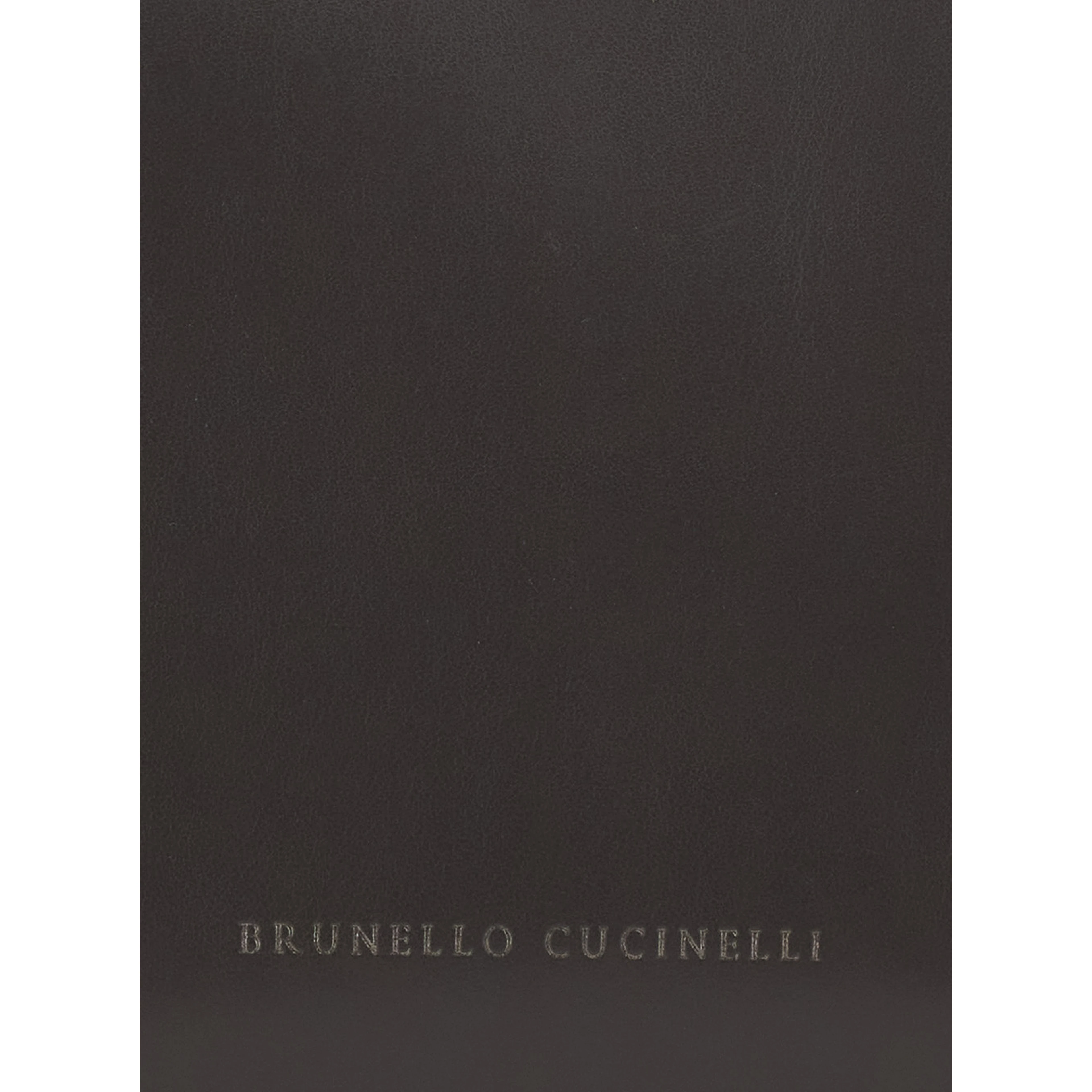 Brown beauty case with embossed logo lettering on the front in leather women