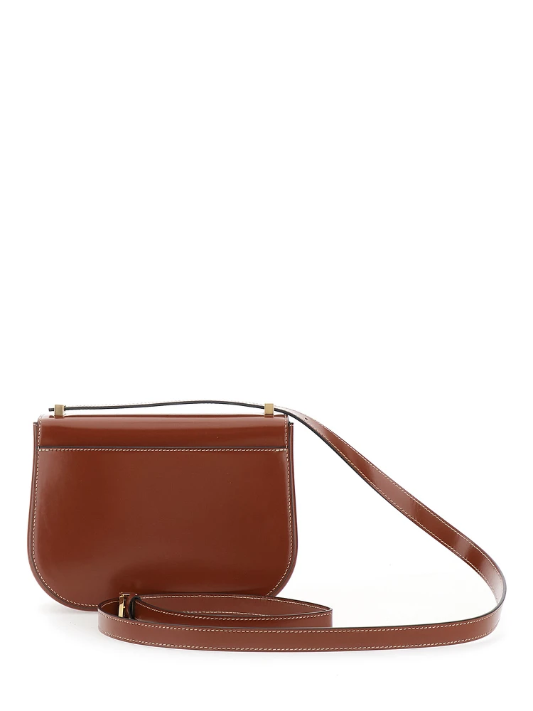Brown crossbody bag with adjustable strap and Gancini plaque on the front in leather for women alternative