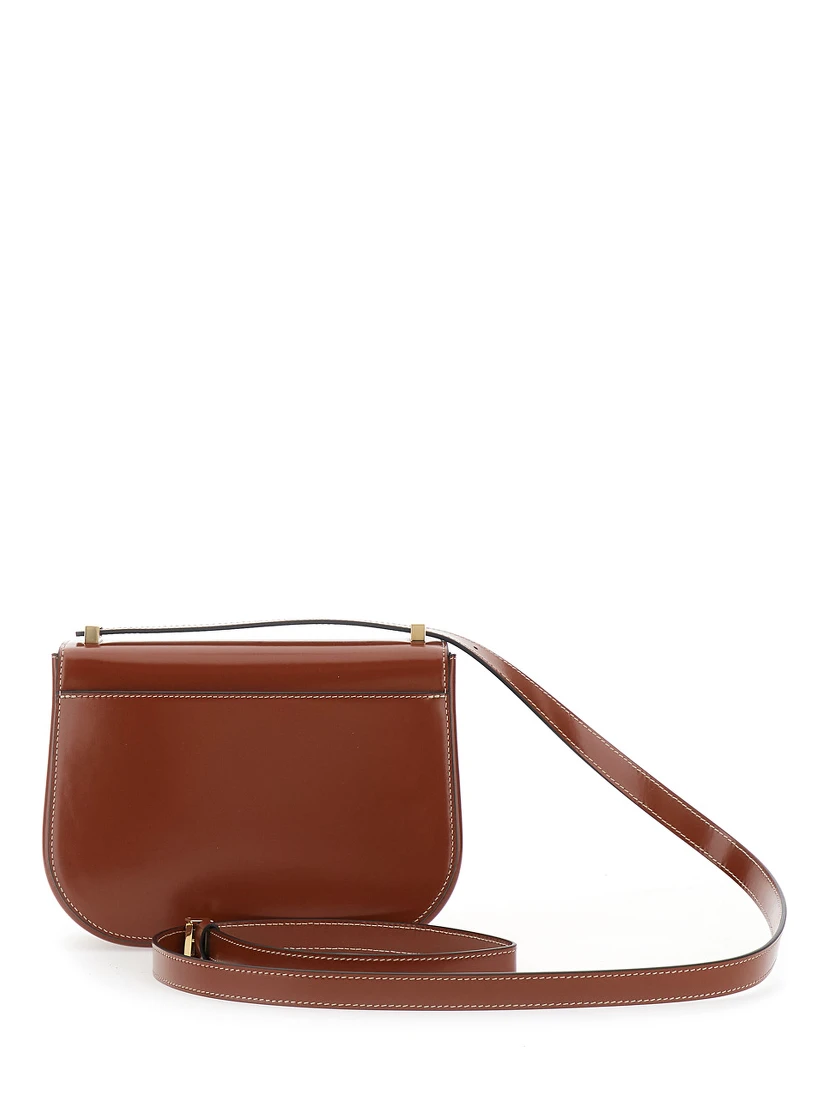 Brown crossbody bag with adjustable strap and Gancini plaque on the front in leather for women