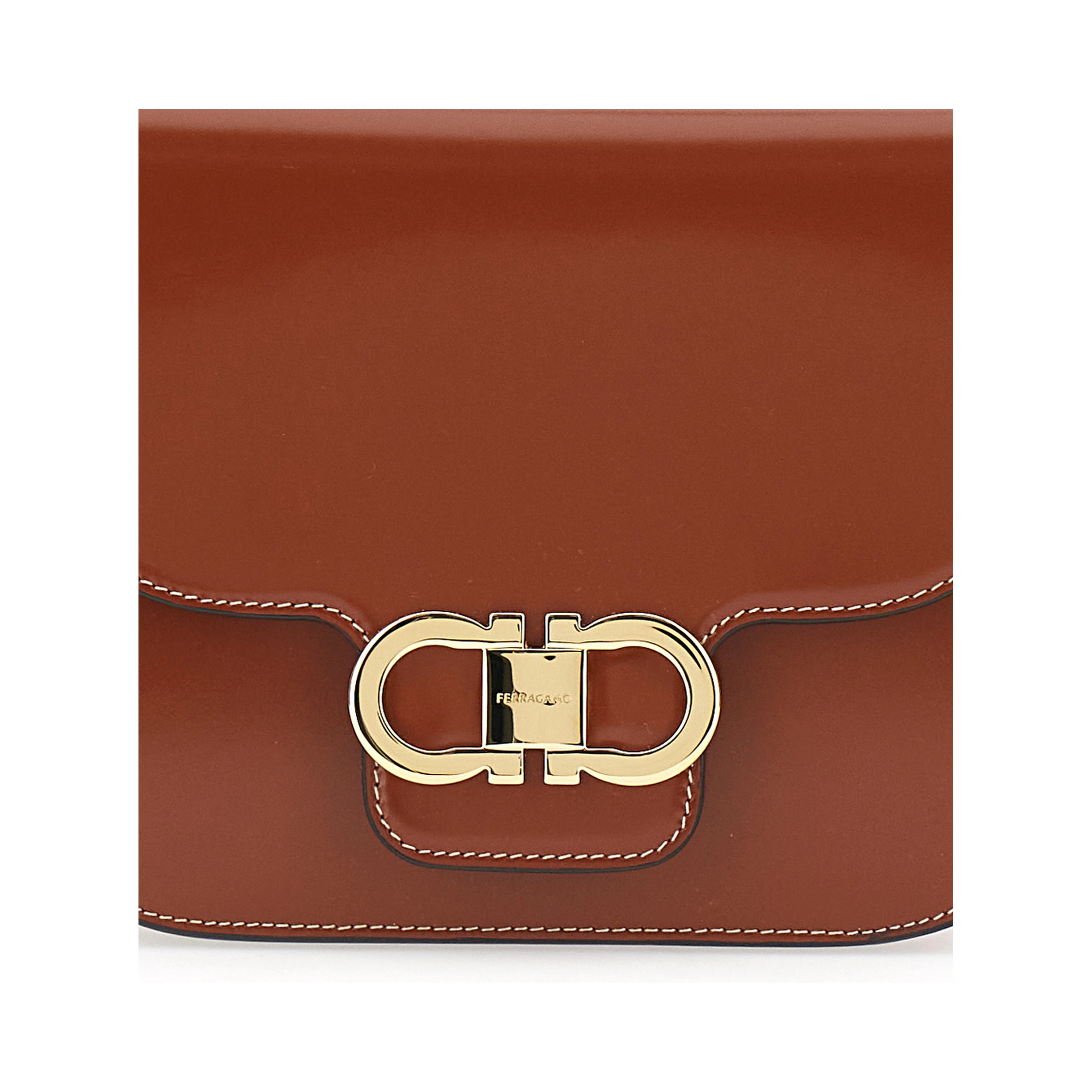 Brown crossbody bag with adjustable strap and Gancini plaque on the front in leather for women