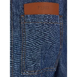 Blue Dress with classic collar and leather logo patch on the front in denim for women