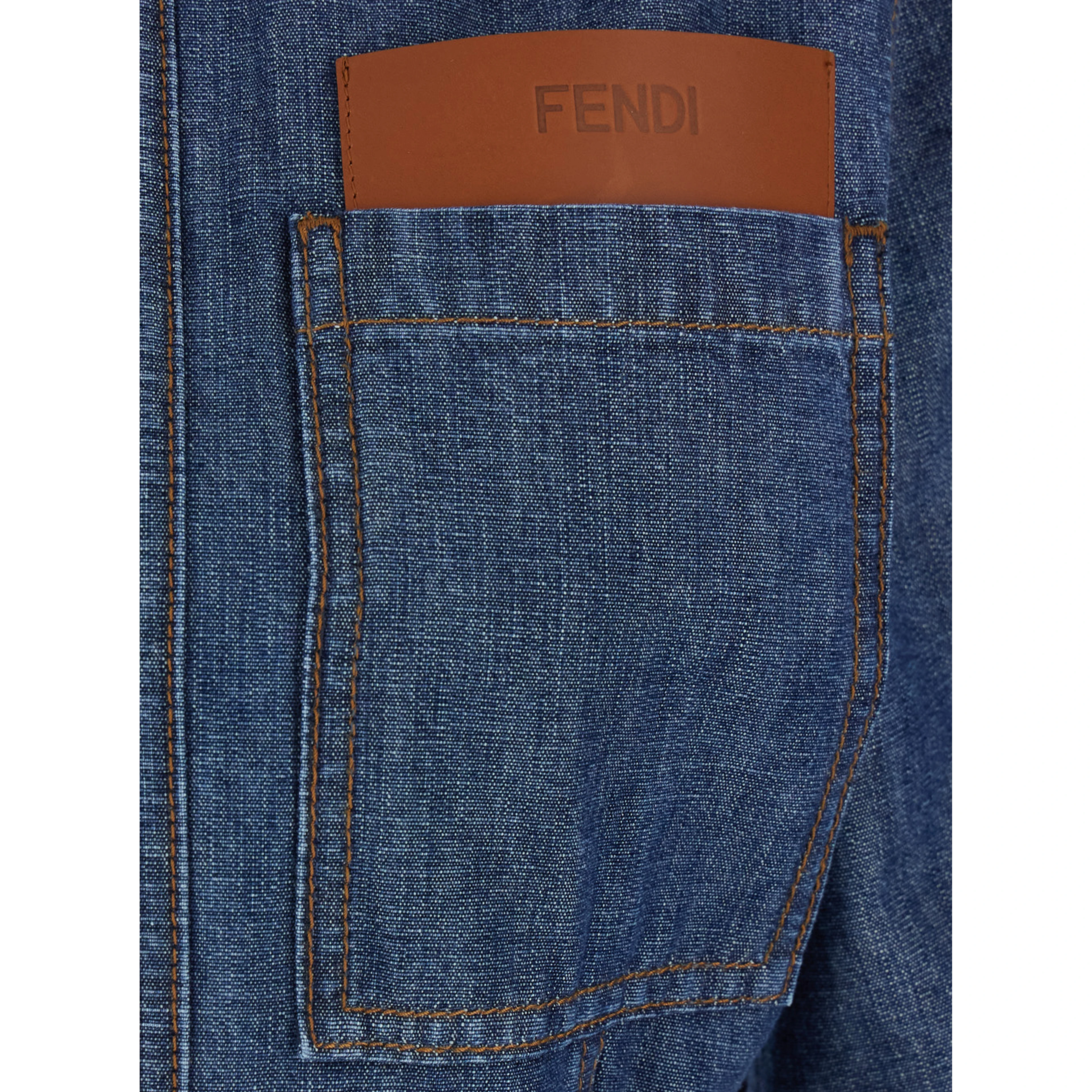 Blue Dress with classic collar and leather logo patch on the front in denim for women