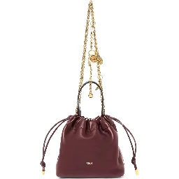 Icon Bordeaux handbag with sliding chain shoulder strap and charm in leather for women
