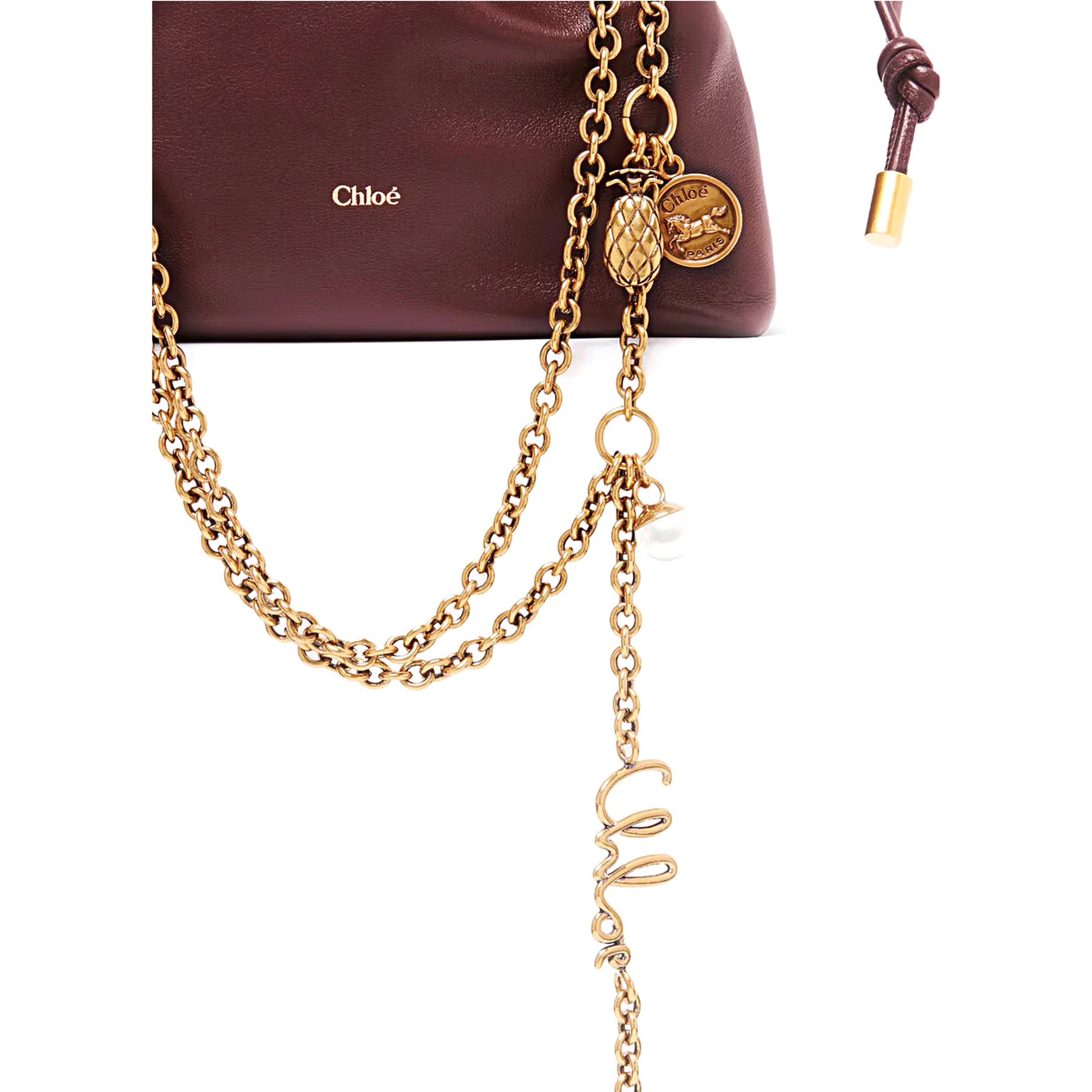 Icon Bordeaux handbag with sliding chain shoulder strap and charm in leather for women