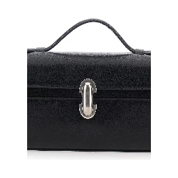Slim Symmetry Clutch in black vintage leather for women
