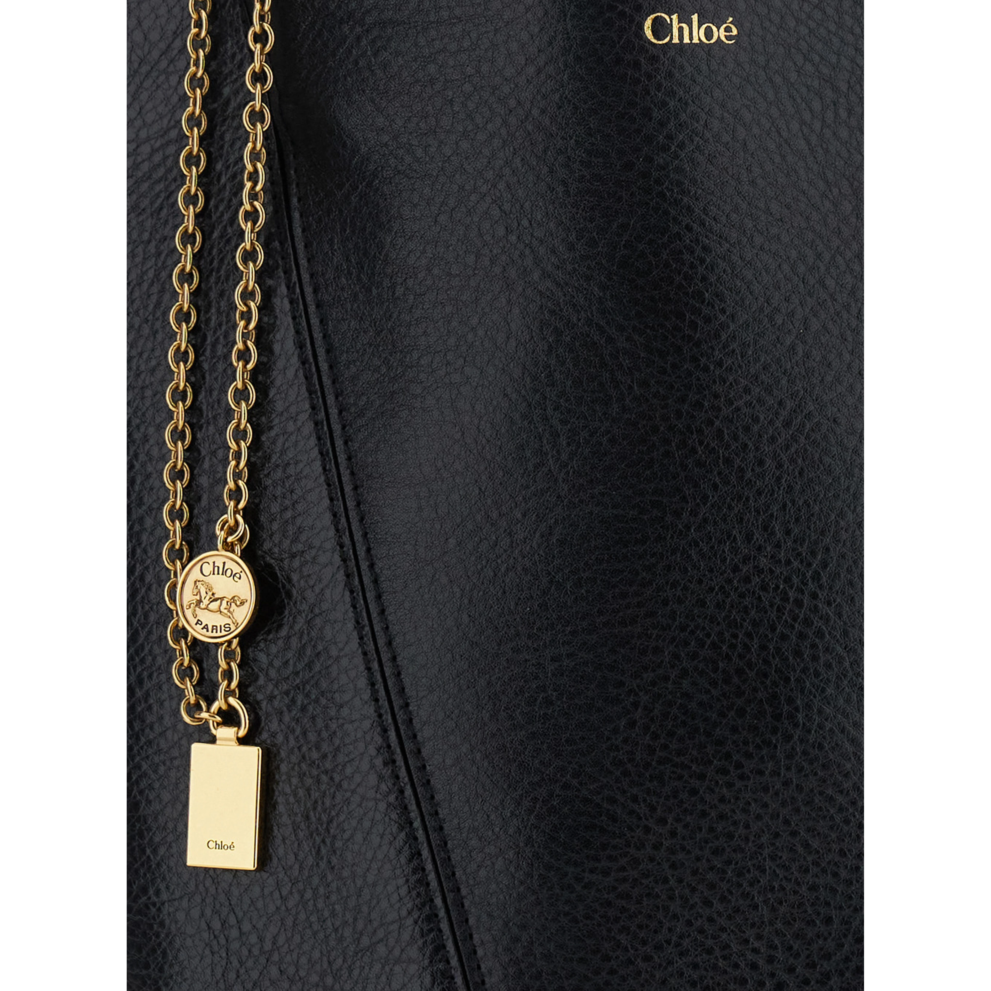 Shoulder Bag Spin with Logoed Metal Medals in Black Grained Leather for Women