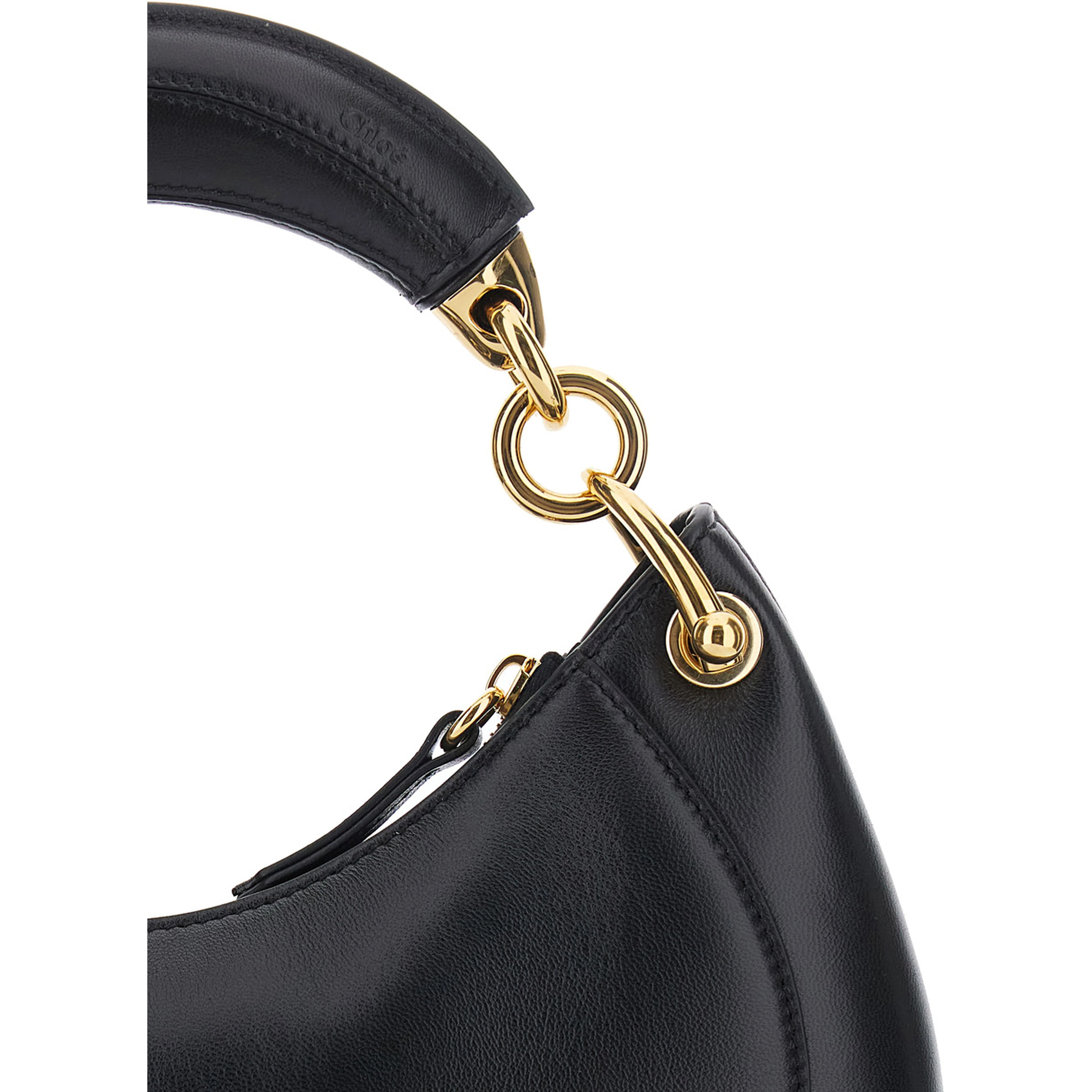 Banana Black Handbag with Adjustable and Removable Shoulder Strap and Logo Charm on the Front in Leather for Women