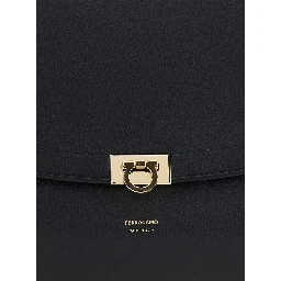 Black Shoulder bag with adjustable strap and Gancini buckle closure in leather for women