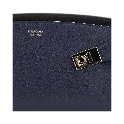 Hug East West Blue Shoulder bag with strap on the front and Logo lettering on the front in leather for women