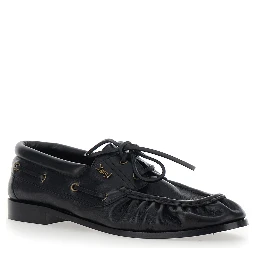 Le Loafer Bateau Black Boat Shoes with Hand-Stitched Moc Toe and Cassandre Plate in Grained Leather Men