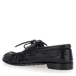 Le Loafer Bateau Black Boat Shoes with Hand-Stitched Moc Toe and Cassandre Plate in Grained Leather Men