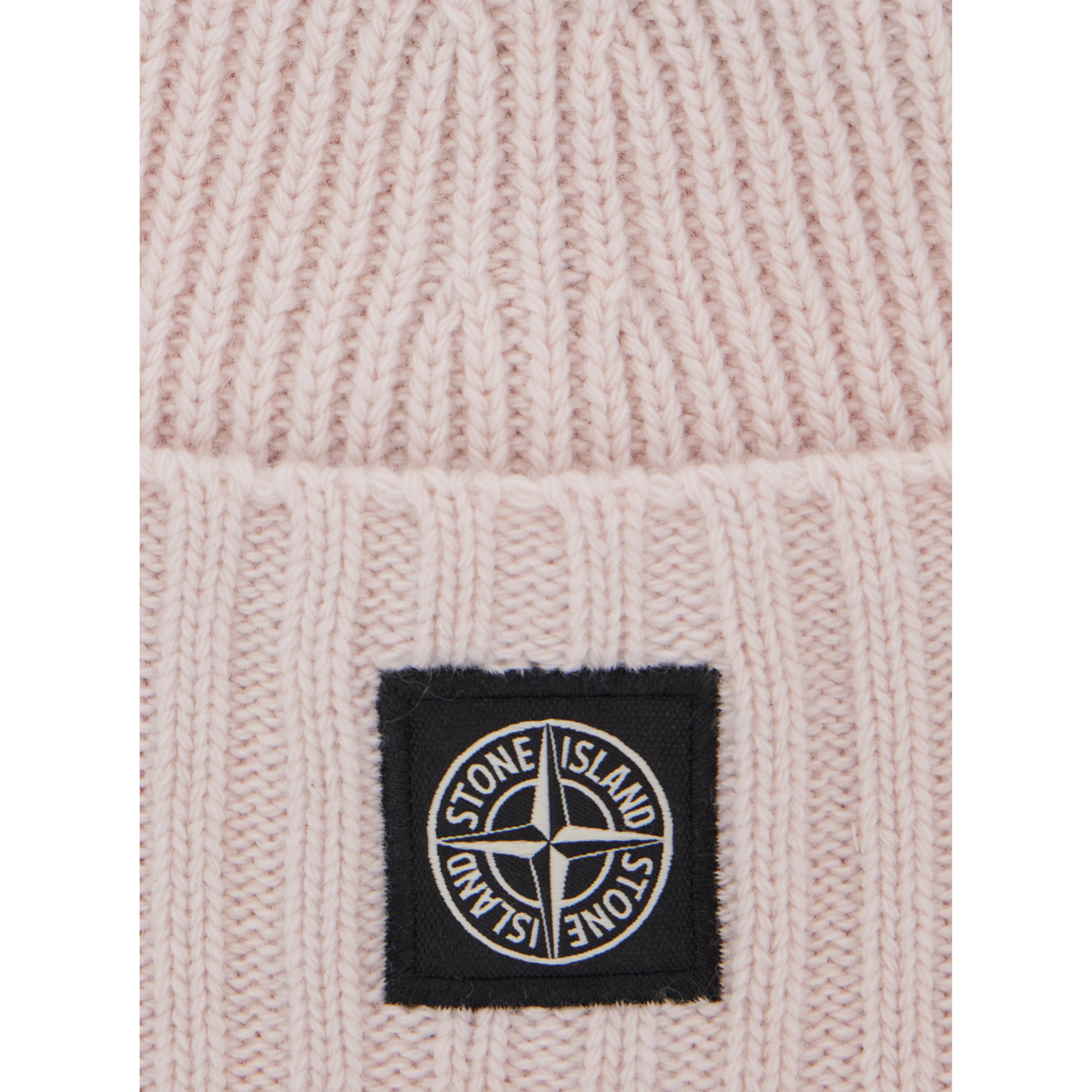 Pink beanie with turn-up brim and logo patch on the front in blend wool boy