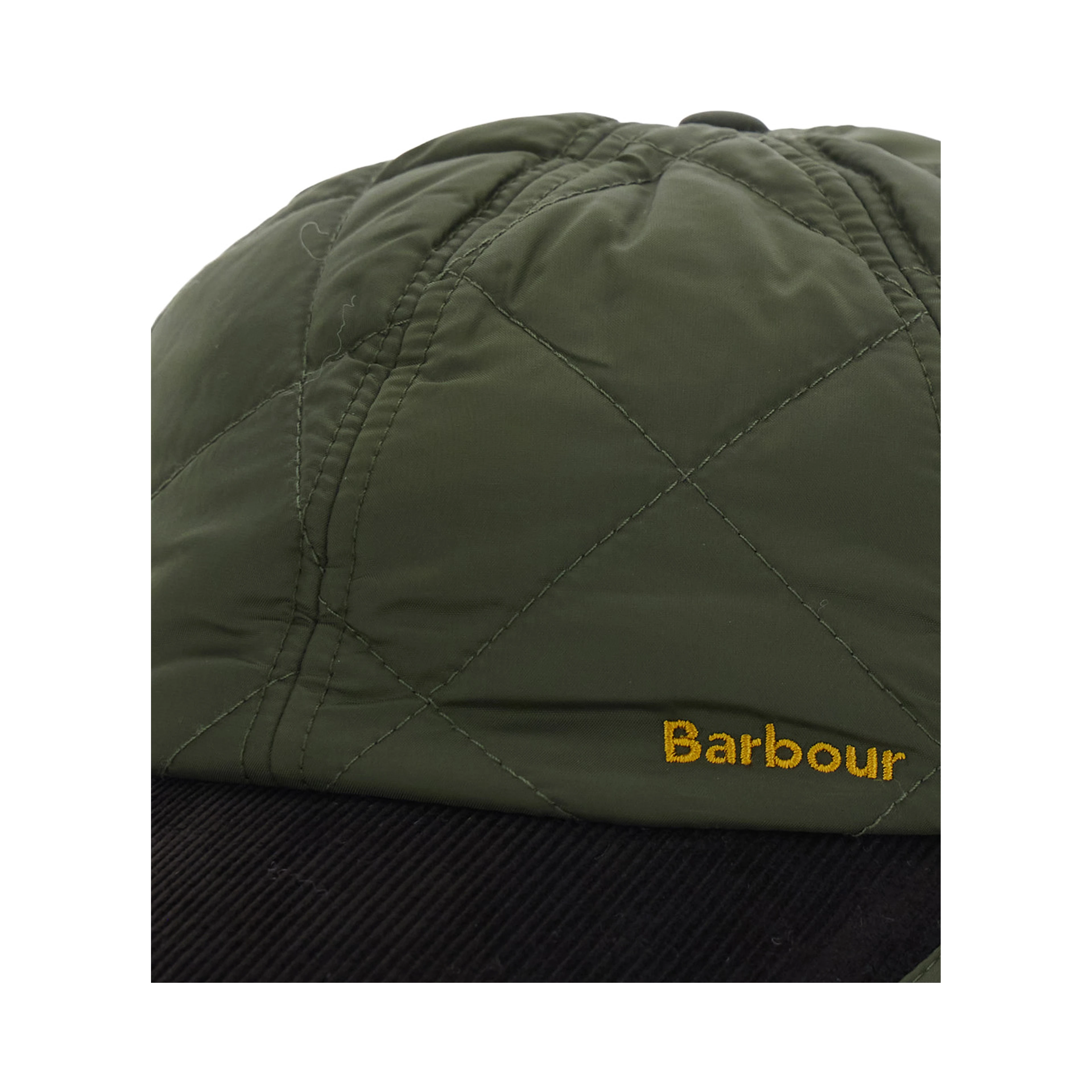 Quilted cap with visor and green cotton details unisex