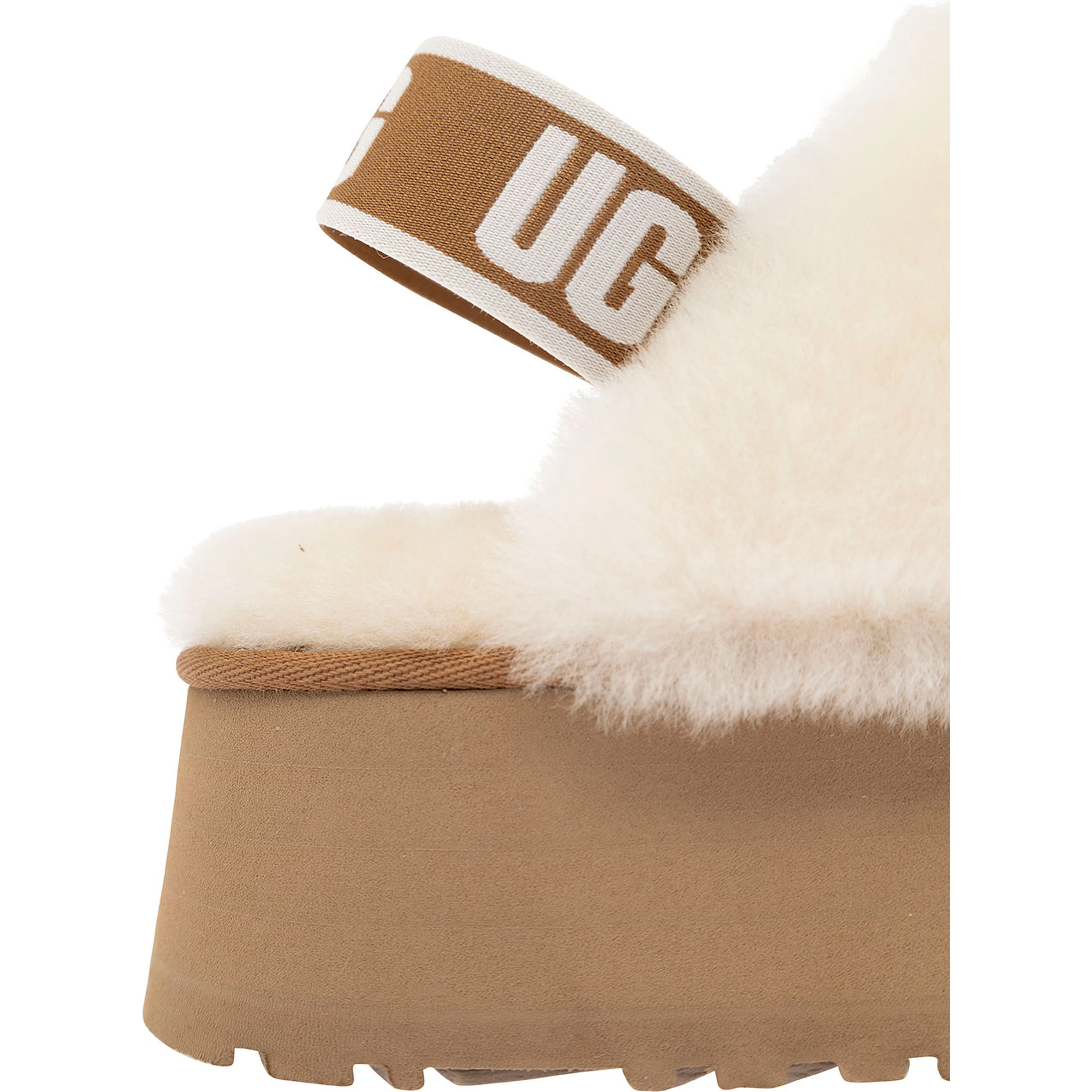 W FUNKETTE is a slipper with fur and brown rubber sole for women