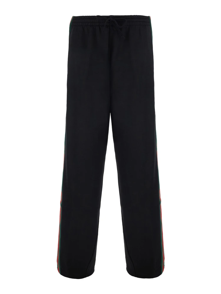Black pants with elasticated drawstring waist and Web detail on the side in cotton and silk for men