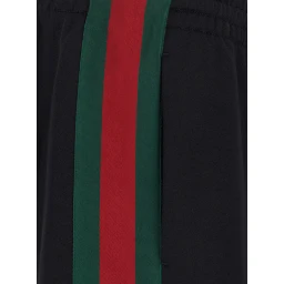 Black pants with elasticated drawstring waist and Web detail on the side in cotton and silk for men