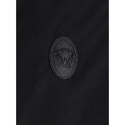 Black jacket with Medusa logo patch on the front in Tech Fabric men