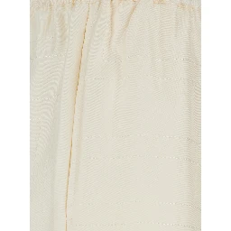 White Pants with elasticated waist and two side pockets in silk for women