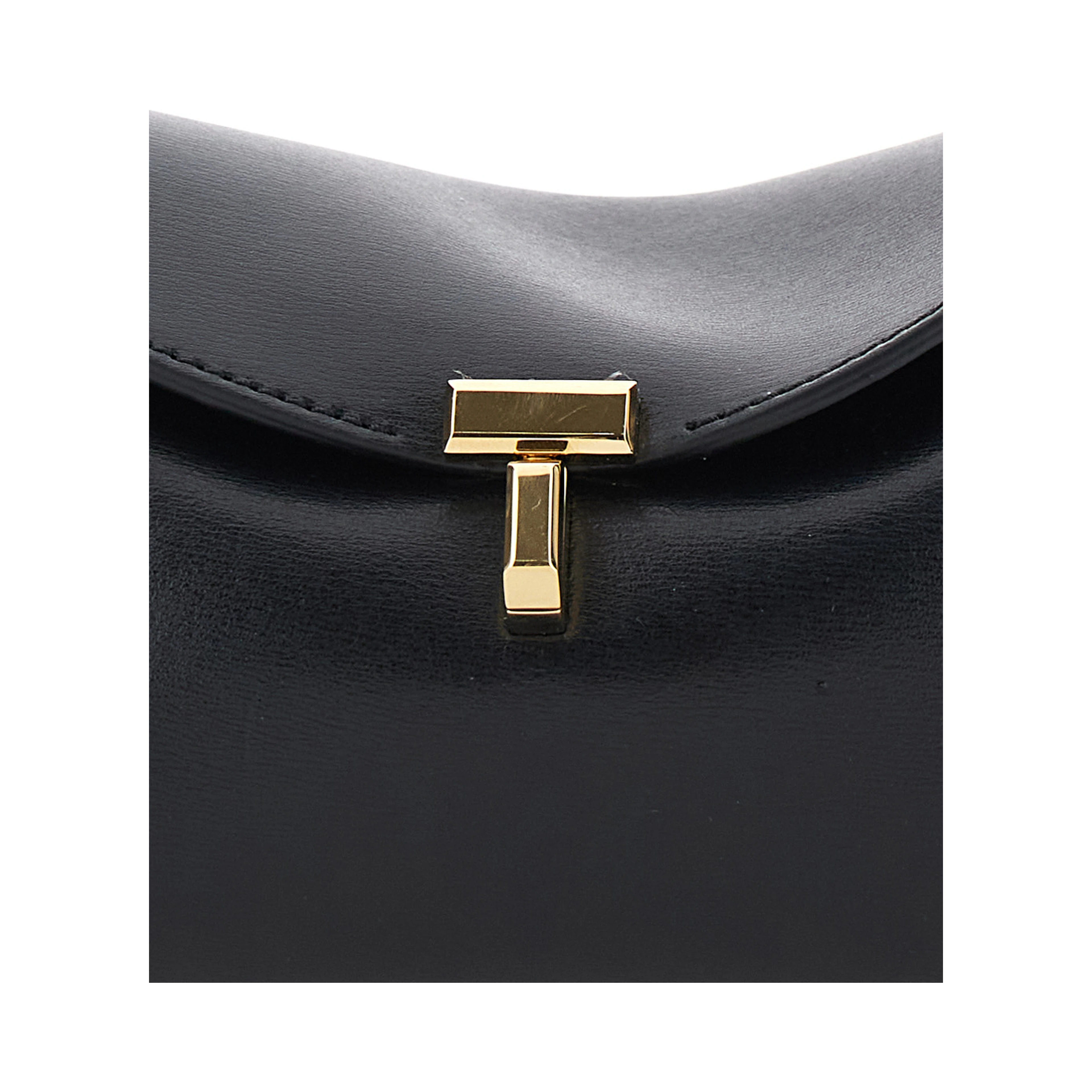 T-Lock Mini black Crossbody bag with metal T closure in leather for women