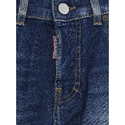 Blue Jeans with ripped details on the front and logo patch on the back in denim Boy