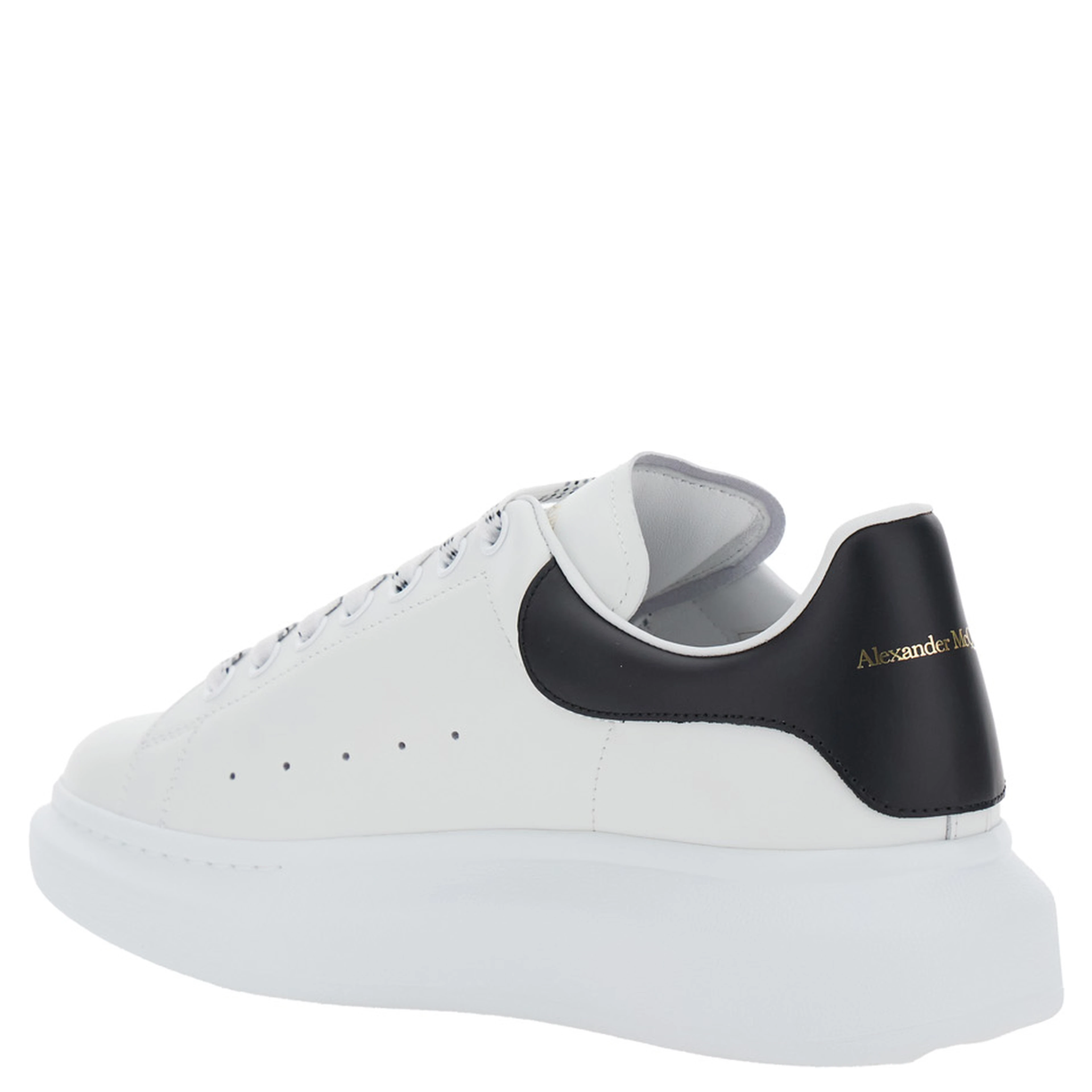 Low Top Sneaker Alexander McQueen with logo lettering on tongue and contrasting heel in white and black leather for men