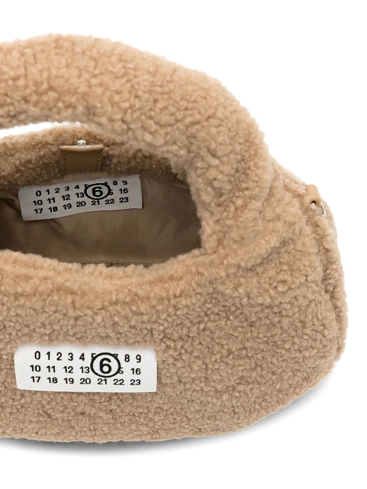 Brown Crossbody bag with logo patch on the front and shoulder strap in eco fur girl alternative