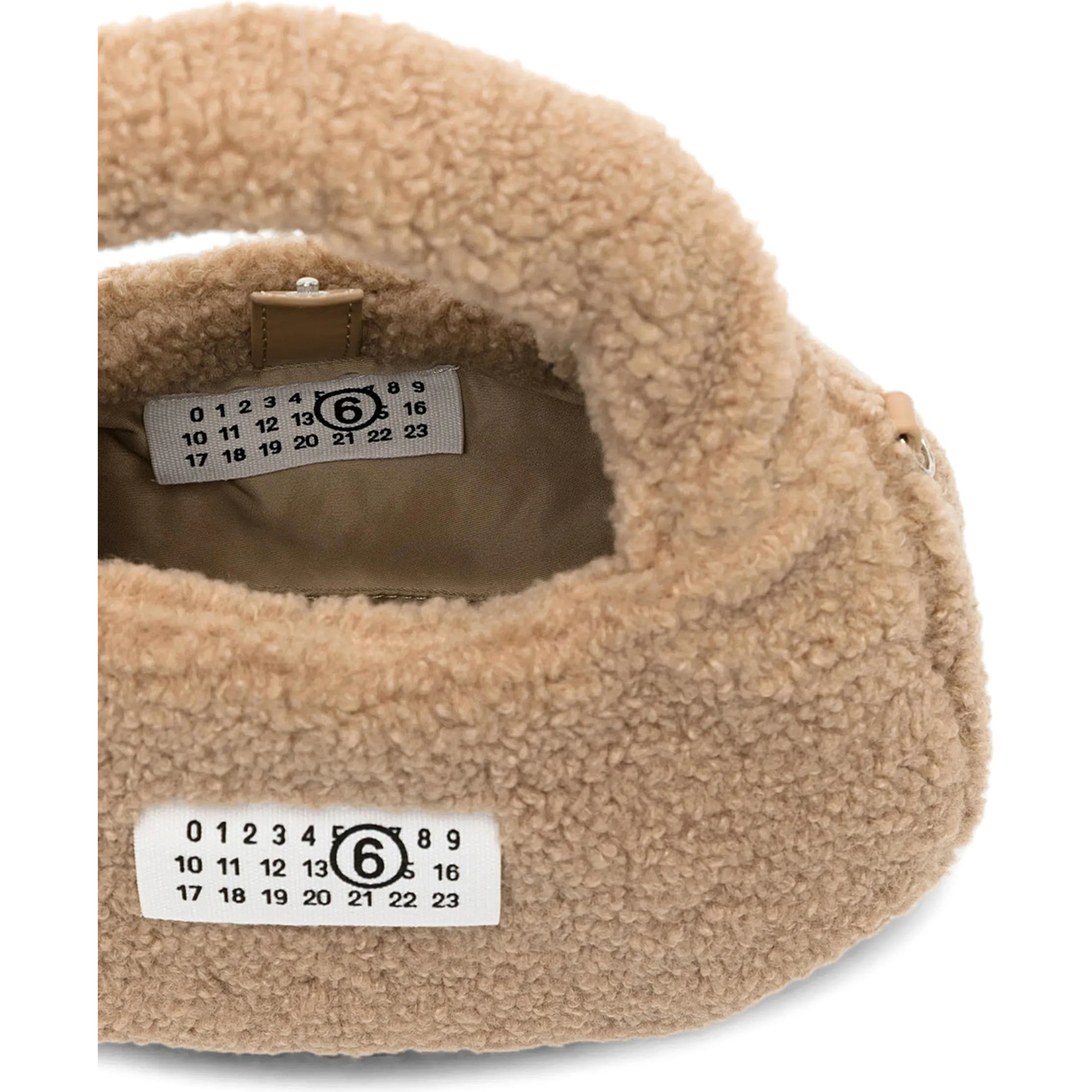 Brown Crossbody bag with logo patch on the front and shoulder strap in eco fur girl