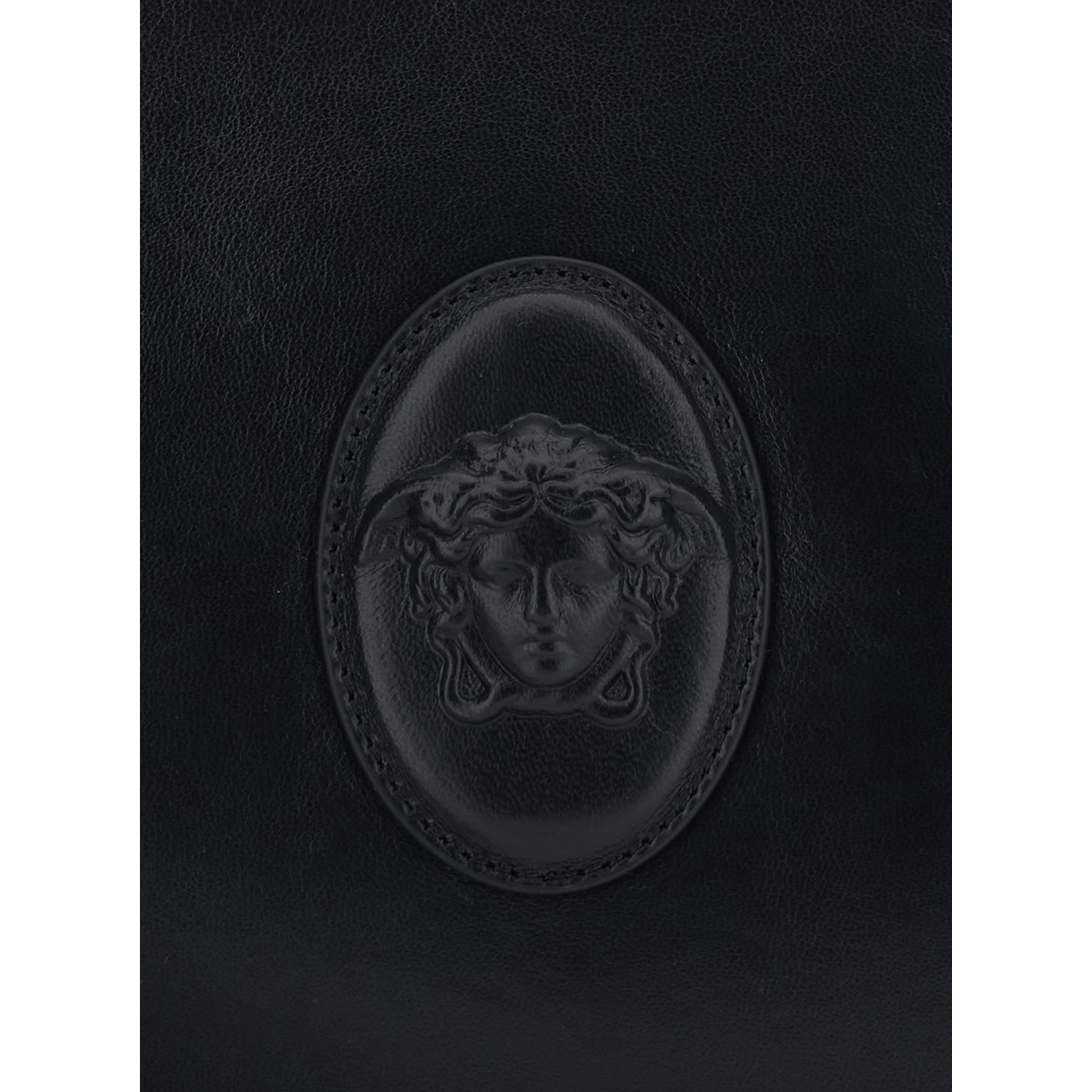 Black Clutch with removable wrist strap and Medusa on the front in leather for men