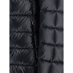 Down jacket with fixed hood and zip pockets in black tech fabric for women
