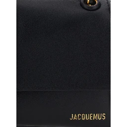 LE BAMBINO CHAINE is a crossbody bag in black lamb leather with unisex metallic details